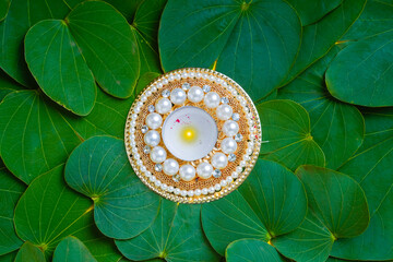 Indian festival dussehra , green leaf ,flowers and lamp