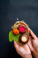 Indian festival Dussehra, green apta leaf in hand