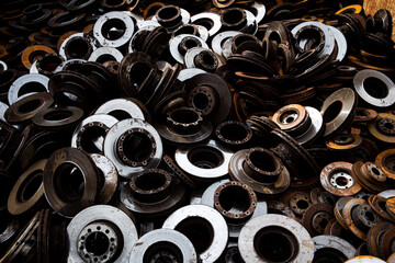 A scrap of Rusty brake discs from a recycling company for the purpose of background or wallpaper