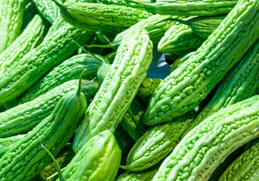Bitter melons on Asia supermarket. Bitter melon pattern and background. Healthy food