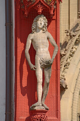 Scupture of Adam at the main portal of Mary's chapel in Würzburg, Germany