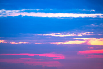 Naklejka na ściany i meble Calm evening sky with colorful clouds 