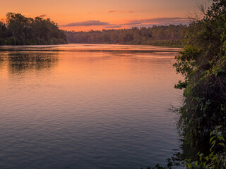 Fototapeta na wymiar Beautiful Riverside Sunset with Reflections