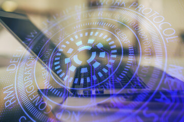 Double exposure of table with computer on background and data theme hologram. Data technology concept.