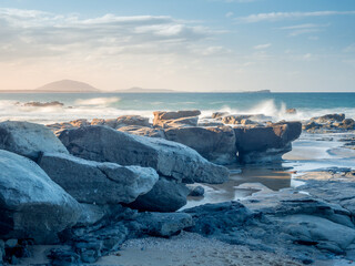 Seascape with Waves Crashing on Rocks in Afternoon Light
