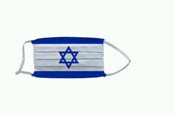 Israeli flag design Covid-19 pandemic  virus face mask  on a white background with copy space