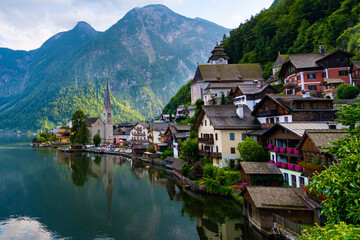 Fototapeta na wymiar Hallstatt in Austria. A beautiful town with traditional houses by the lake. 