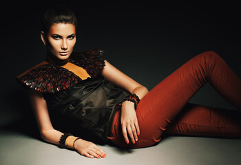 glamorous hot woman laying on the floor