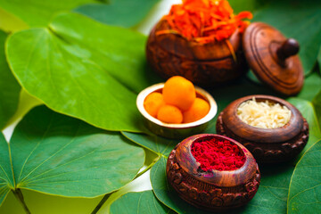 ,Indian festival dussehra , green leaf with rice and sweets