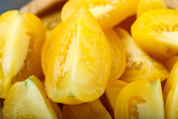 Background from sliced yellow tomatoes.