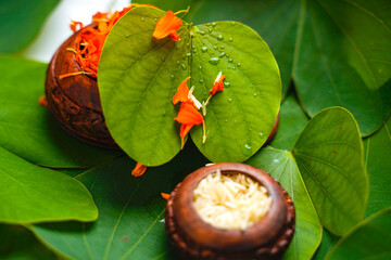 Indian festival dussehra, green apta leaf and rice
