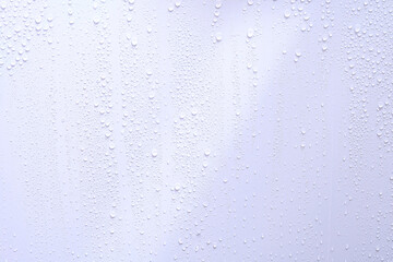 
Water droplets from beside the wall