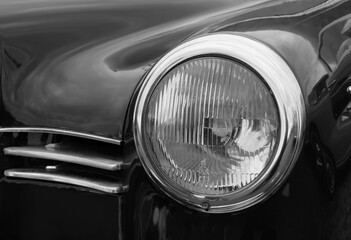 Oldtimer car. Details of oldtimer car in black and white.
