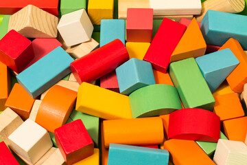 Fototapeta na wymiar Wooden constructor set for children. Colorful block toys for background.