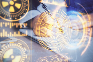 Technology theme hologram over woman's hands taking notes background. Concept of Tech. Double exposure