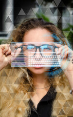 Augmented reality glasses. Smart glasses. Girl in augmented reality glasses. Nanotechnology. Young...