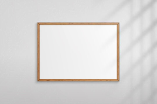 Mockup wood frame photo on wall. Mock up wooden picture framed. Horizontal boarder with shadow. Empty photoframe a4 on background wall. Border for design prints poster and painting image. Vector
