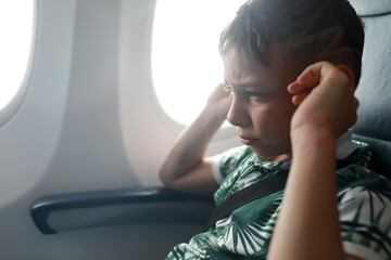 Child has ear pains about plane landing
