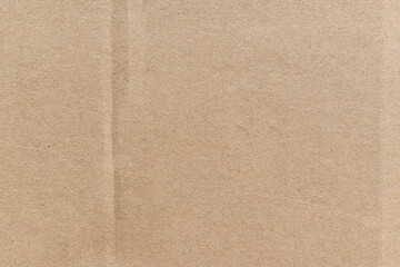 Beige cardboard texture background. Old vintage brown paper box surface.