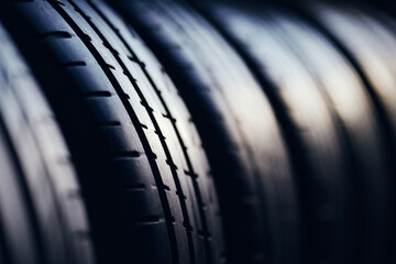 Tire background concept. Stack of tires with selective focus