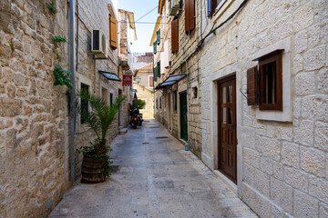 Fototapeta na wymiar Street in Trogir, Croatia. A Medieval town. 