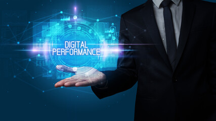 Fototapeta premium Man hand holding DIGITAL PERFORMANCE inscription, technology concept