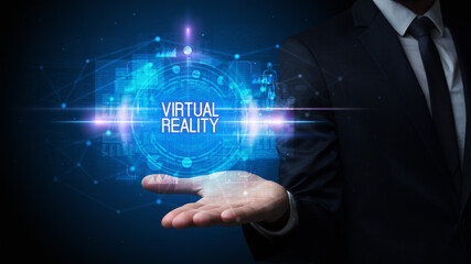 Man hand holding VIRTUAL REALITY inscription, technology concept
