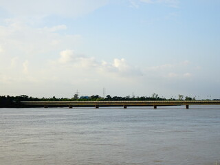 Old bridge standing on river filled with water in Bhubaneswar