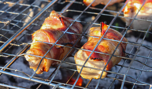 Grilled Bacon Wrapped Chicken Tenders On The Grill. Cooking On The Coals