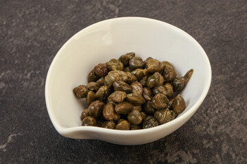 Tasty capers in the bowl