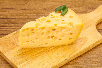 Maasdam cheese - yellow triangle with holes