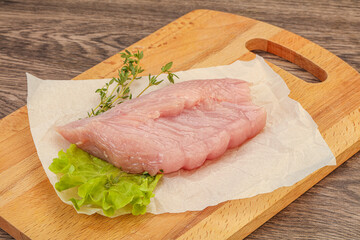 Raw turkey breast steak for cooking