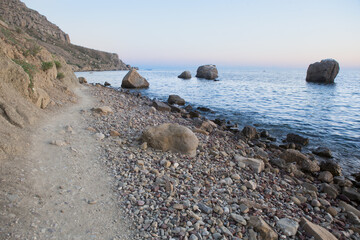 Rocky seashore with boulders in the water