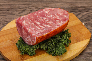 Beef ham piece over board