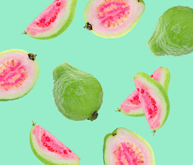 guava fruit isolated on green background.