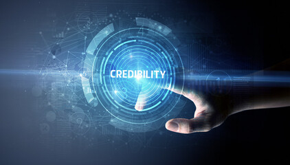 Hand touching CREDIBILITY button, modern business technology concept