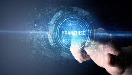 Hand touching FRANCHISE button, modern business technology concept