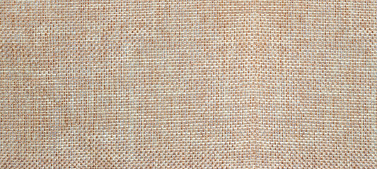 Rustic jute sackcloth fabric raw burlap texture  for empty space text background.