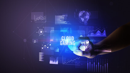 Hand touching CLOUD GAMING inscription, new business technology concept