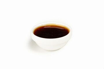 Unagi sauce in a bowl on a white background. For the restaurant menu. Traditional Japanese sushi seasoning. Healthy eating