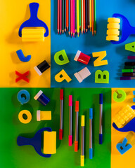 school supplies on colorful background
