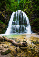 Obraz premium Josefstaler Waterfall in Schliersee, Germany, Bavaria. Long Exporure