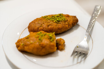 Turkish Dessert Kalburabasti / Sekerpare with Traditional Tea.