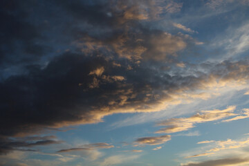 Colorful beautiful cloudy sky texture at sunset.