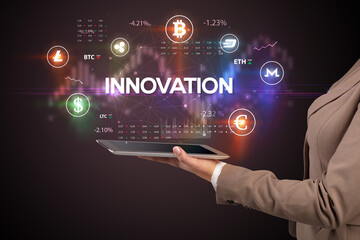 Close-up of a touchscreen with INNOVATION inscription, business opportunity concept