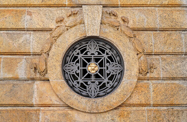 Fototapeta na wymiar Ornamental grid on facade