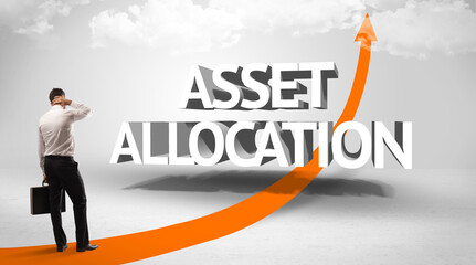 Rear view of a businessman standing in front of ASSET ALLOCATION inscription, successful business concept