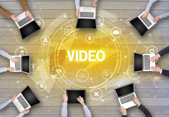 Group of people having a meeting with VIDEO insciption, social networking concept