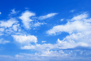 Obraz na płótnie Canvas A blue sky white clouds on nature summer weather background