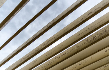 wooden planks on a background of sky and clouds